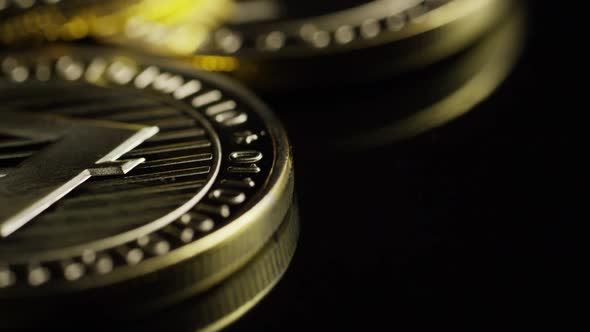 Rotating shot of Bitcoins (digital cryptocurrency) - BITCOIN LITECOIN 267