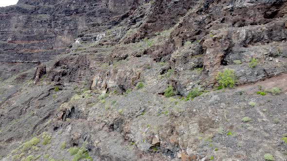 Aerial drone view on rough volcanic mountainsides in Anaga National Park in Tenerife, Canary Islands