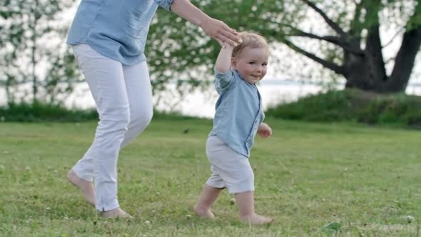 Mother and Toddler Spending Time in Park alt
