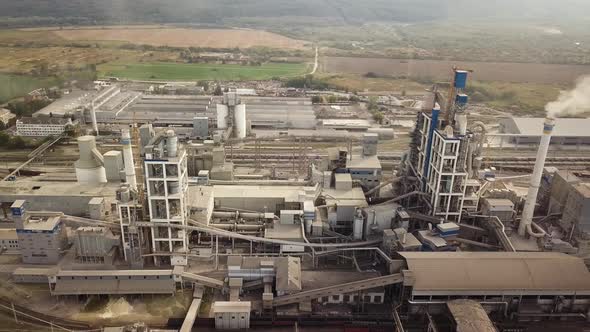 Aerial view of cement plant factory at industrial production area.