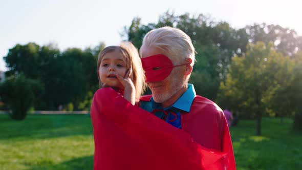 Happy Grandfather and His Small Cute Niece Posing