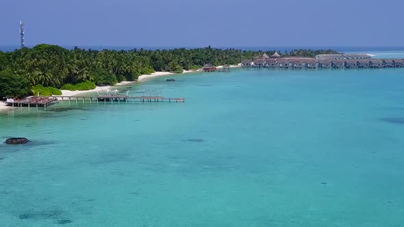 Drone aerial scenery of exotic tourist beach by clear water and sand background