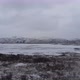 Frozen landscape in norway, a frozen lake in a valley - VideoHive Item for Sale