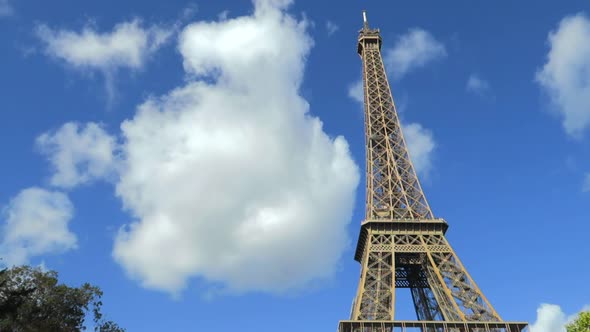Eiffel Tower Day time Blue sky big cloud goes past TIME LAPSE France, Paris