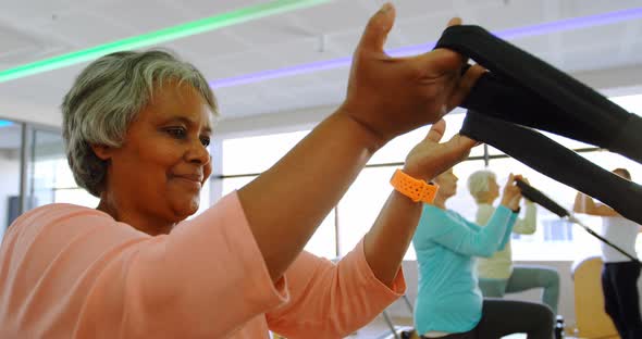 Group of senior women doing stretching exercise 4k