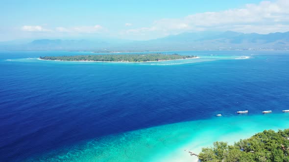 Island In Samoa - Gorgeous Scenery Of Lush Island Surrounded By Deep Blue Sea Water With Mountain In