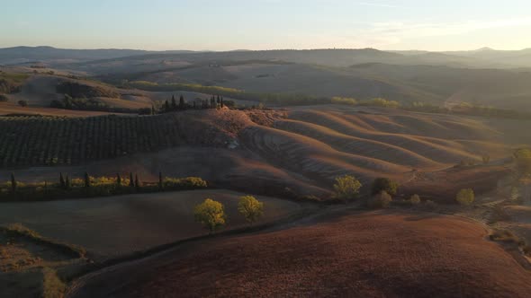 Val d'Orcia Farmhouse Countryside in Autumn Aerial View, Tuscany