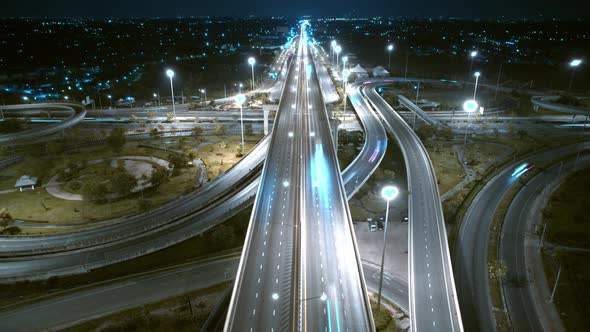 4K : Time lapse Aerial view and top view of traffic on city. Expressway with car lots