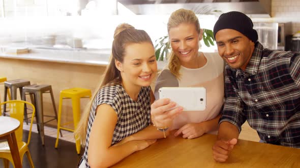 Executives taking selfie with digital tablet 4k