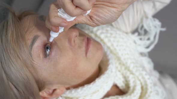 Old Woman in Scarf Using Eye Drop From Dryness, Health Support, Pharmacy