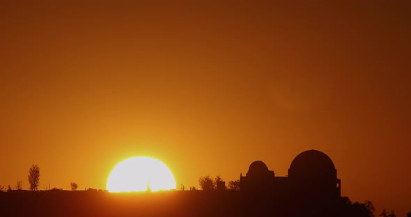 Time lapse of the sun rising from behind the Griffith Observatory