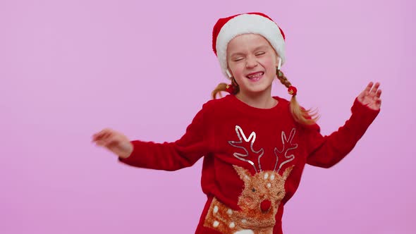 Girl in Christmas Sweater Listening Music Via Earphones Dancing Disco Fooling Around Having Fun