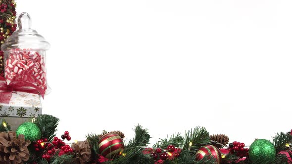 Panning view of wreath garland against white screen