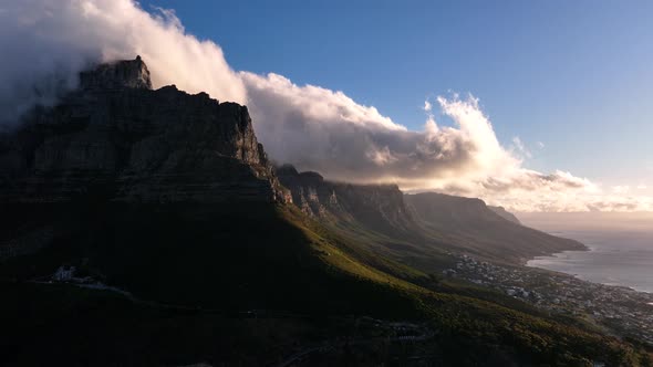 Clouds enveloping the Twelve Apostles at sunset, Cape Town; aerial