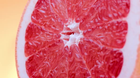 Macro Shot of Rotating Grapefruit Flesh Structure