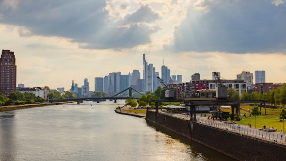 Frankfurt skyline hyperlapse time lapse, blue sky with clouds, office buildings and skyscraper