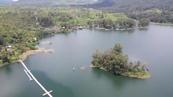 Aerial view of lake side with park and mountain in Bandung, Indonesia