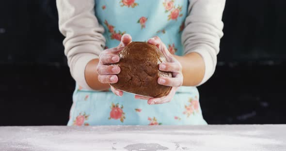 Woman molding a dough 4k