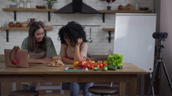 Wide Shot Portrait of Happy Proud Young Women Smelling Delicious Croissant Smiling