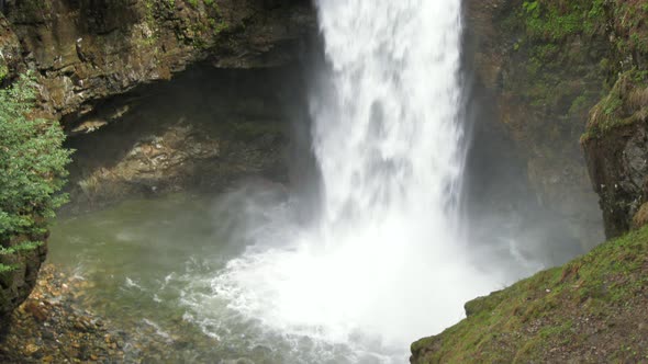 Water Drops in Waterfall Pool Going to Mossy Rocks