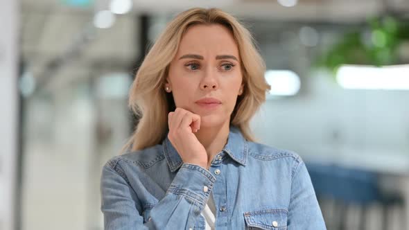 Young Woman Thinking About Something