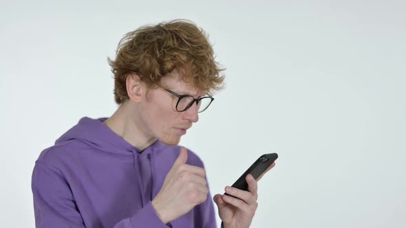 Failure on Smartphone By Redhead Young Man White Background