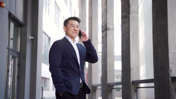 portrait successful young confident businessman talking background modern office 