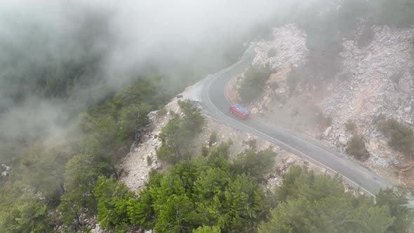 Foggy road in the mountains aerial view 4 K