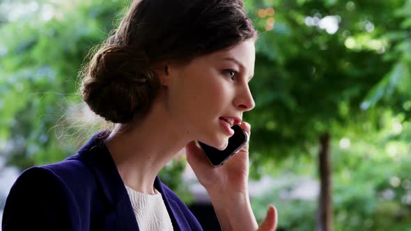 Woman talking on mobile phone