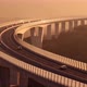 Cars Driving on a Highway Viaduct at Sunset  - VideoHive Item for Sale