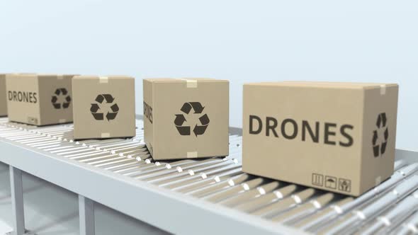 Cartons with Drones on Roller Conveyor