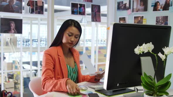 Young woman working in a creative office