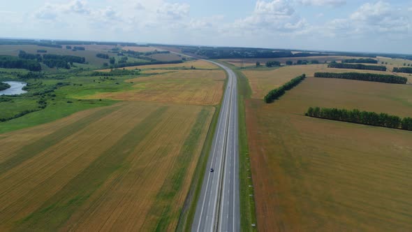 Hyperlapse Drone Flies Over the Highway, Cars Are Driving