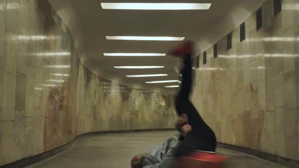 Black Man Dancing Hip-hop in an Underground Crossing