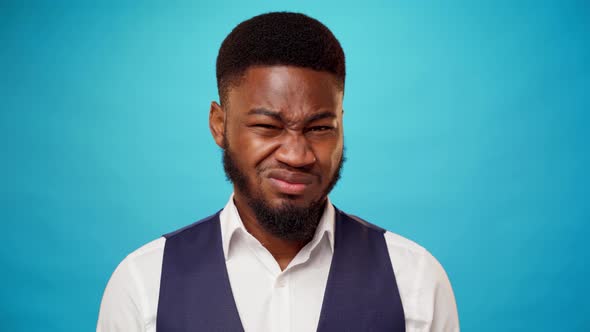 Young Bearded African Man Expressing Disgust and Aversion