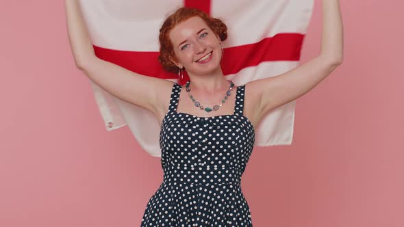 Happy Young Woman Waving British Flag Looking Smiling at Camera Celebrating Independence Day
