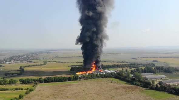 Aerial View of Huge Fire View From Quadcopter. Black Smoke Rises High Into the Sky. Fire on the