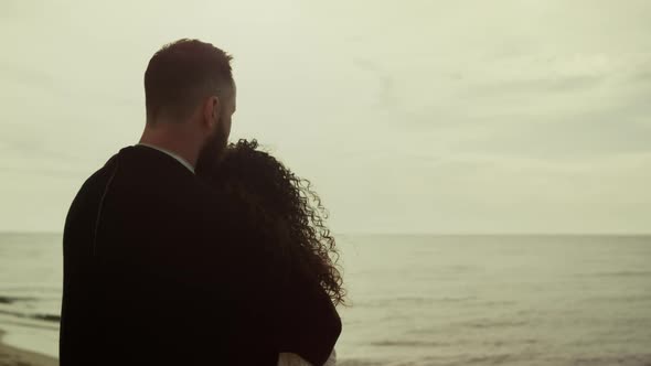 Lovers Looking Sea View on Beach Date