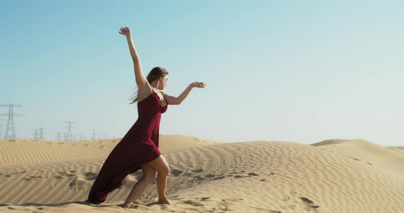 Stunning Great Sandy Desert in the Background of a Young Lady Dancing