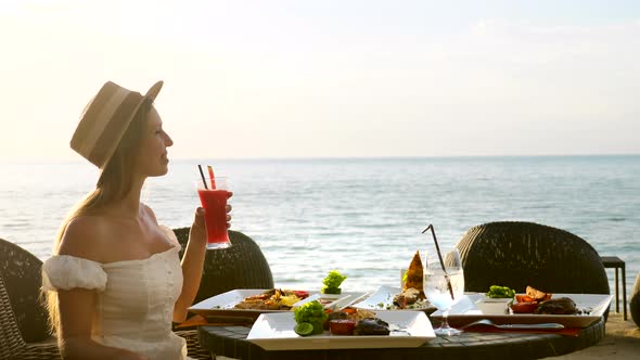 Beautiful Girl Wear Hat Enjoy Her Vacation Looking at Sea Fine Dining Food Set