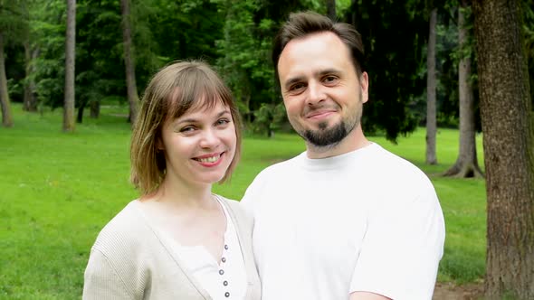 Happy Couple, Man and Woman, Smile To Camera, Park