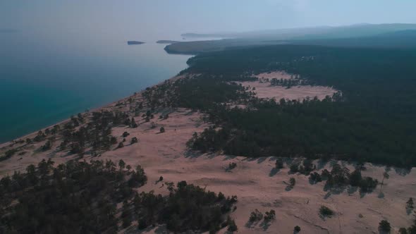 Aerial View of Sand Dunes Baikal Beach and Crystal Clean Water of Baikal Lake