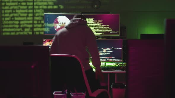 Criminal Hacker In Dark Office
