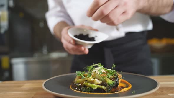 The Chef Serves a Delicious Dish of Pumpkin Puree Cutlets and Broccoli