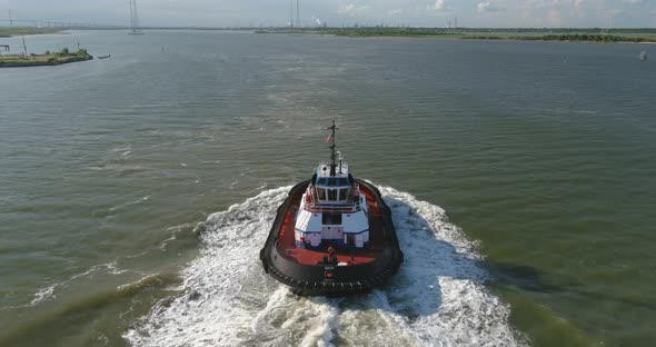 Drone view of tugboat in water