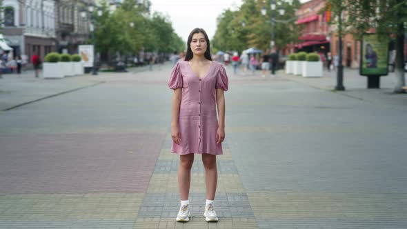 Time Lapse of Attractive Asian Woman Standing in City Center in Pedestrian Street