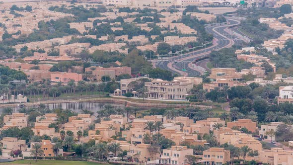 Aerial View of Apartment Houses and Villas in Dubai City Timelapse United Arab Emirates