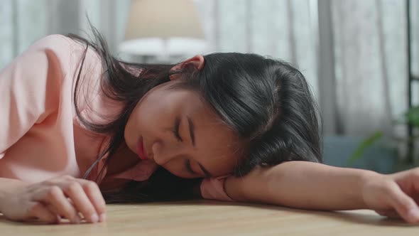 Close Up Of Drunk Asian Woman Sleeping At Home