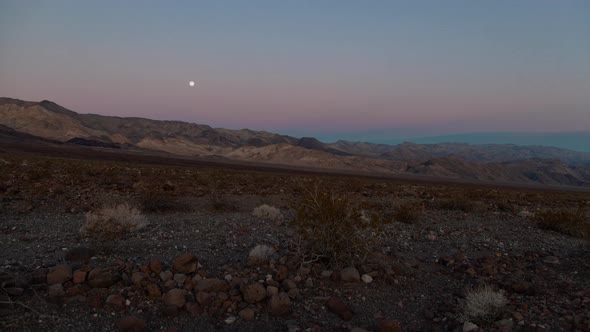 Moonset and sunrise over the Panamints - Death Valley National Park - Time lapse