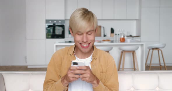 Amazed Man Receiving Sms Message Offer Opportunity Happy Male Reading Good News in Smartphone
